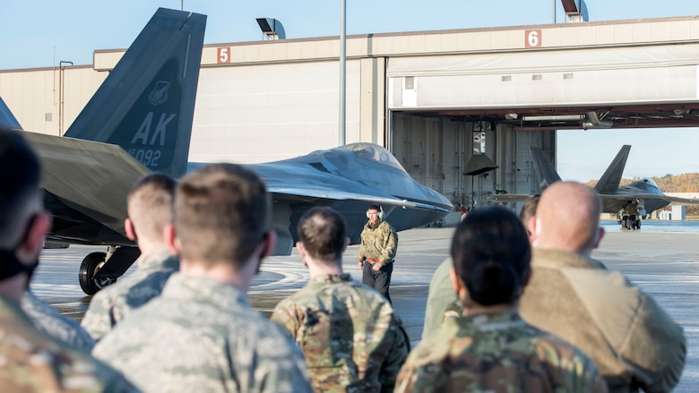 U.S. Airmen with the 673d Communications Squadron attend a 90th Fighter Squadron immersion at Joint Base Elmendorf-Richardson, Alaska, Sept. 29, 2020. The tour provided the Airmen with a behind-the-scenes experience of the operations in the 90th FS and showcased the 90th FS’s mission that JBER’s Airmen support. Leadership of the 90th FS hopes to expand the program in the future.