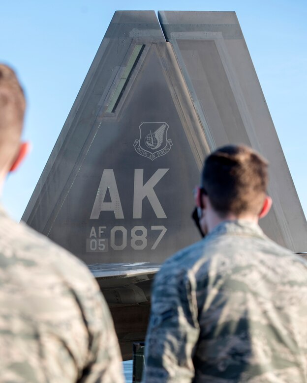 U.S. Airmen with the 673d Communications Squadron attend a 90th Fighter Squadron immersion at Joint Base Elmendorf-Richardson, Alaska, Sept. 29, 2020. The tour provided the Airmen with a behind-the-scenes experience of the operations in the 90th FS and showcased the 90th FS’s mission that JBER’s Airmen support. Leadership of the 90th FS hopes to expand the program in the future.