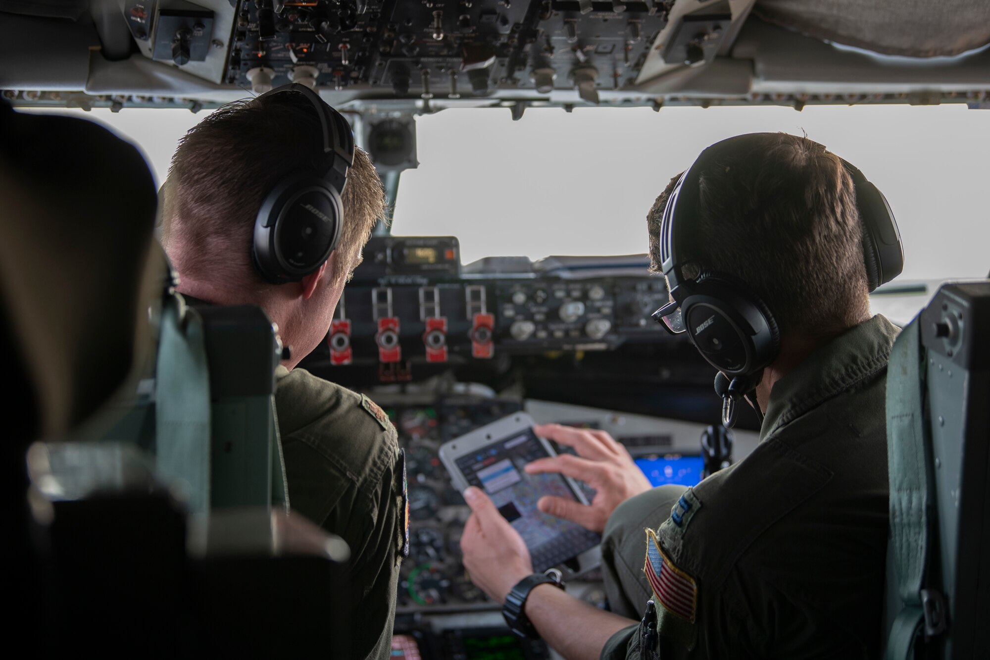 U.S. Air Force Maj. Doug Karl and Capt. Richard Hall, both pilots assigned to the 91st Air Refueling Squadron, perform pre-flight procedures prior to takeoff from MacDill Air Force Base, Fla., Sept. 30, 2020.