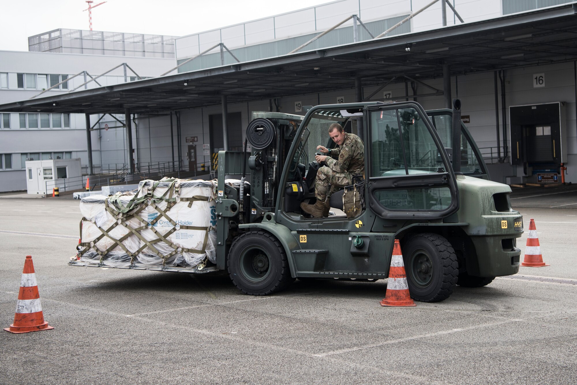 U.S. Air Force Tech. Sgt. Richard Ton, 721st Aircraft Maintenance Squadron crew chief, practices pallet operations in a 10k forklift.