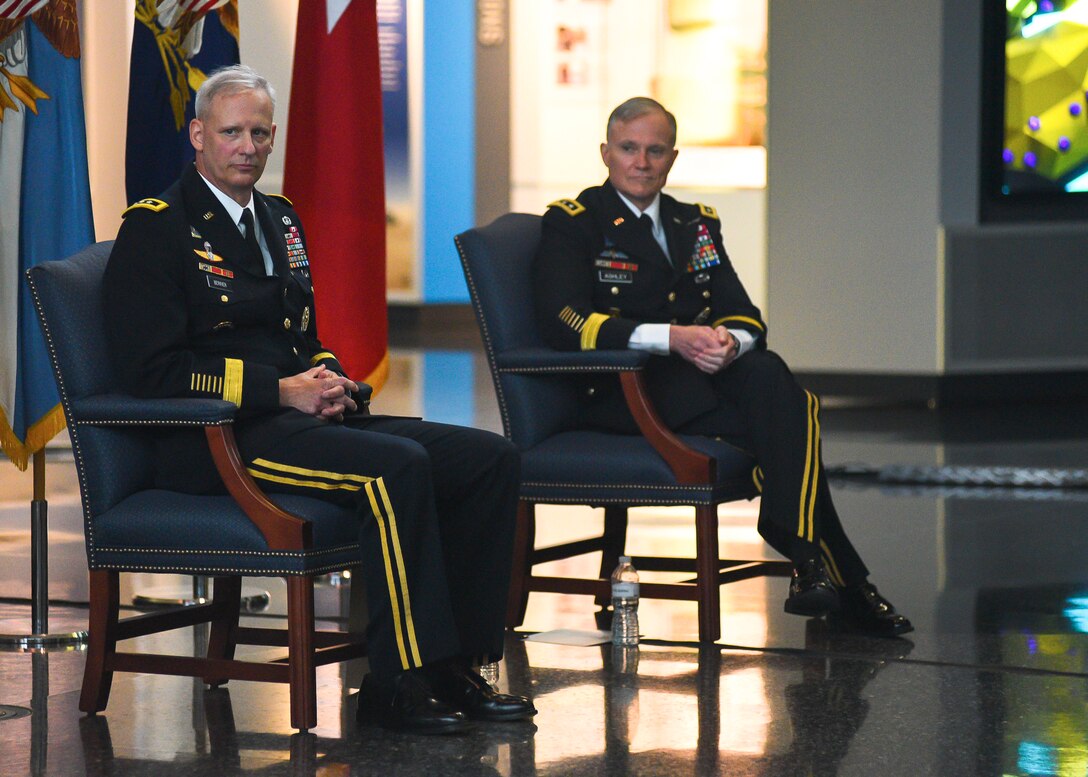 The 22nd Director of the Defense Intelligence Agency Lt. Gen. Scott Berrier (left) sits next to former DIA Director Lt. Gen. Robert Ashley Jr. during the change of change of directorship ceremony, Oct. 1, at DIA Headquarters.