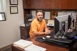 Jake Stover is an assistant deployment specialist for 1st Theater Sustainment Command. The command has been continuously deploying to the U.S. Central Command (CENTCOM) area of responsibility since 2006. (U.S. Army photo by Sgt. Bethany Williams)