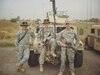 ake Stover (left), deployment specialist, 1st Theater Sustainment Command, with fellow cavalry scouts while he was deployed with 2nd Brigade, 1st Armored Division to Baghdad in 2006. Stover deployed to Iraq multiple times following the events of 9/11. Stover stated that being deployed in Iraq helped him understand the value of being prepared. (Courtesy Photo)