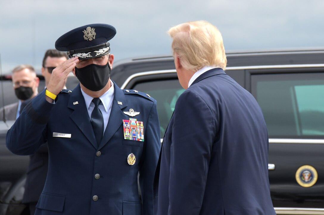 Maj. Gen. John Healy, 22nd Air Force commander, salutes President Trump as he departs Air Force One at Dobbins Air Reserve Base, Ga., Sept. 25, 2020. The president arrived at Dobbins to attend a meeting at the Cobb Galleria. (U.S. Air Force photo/Andrew Park)