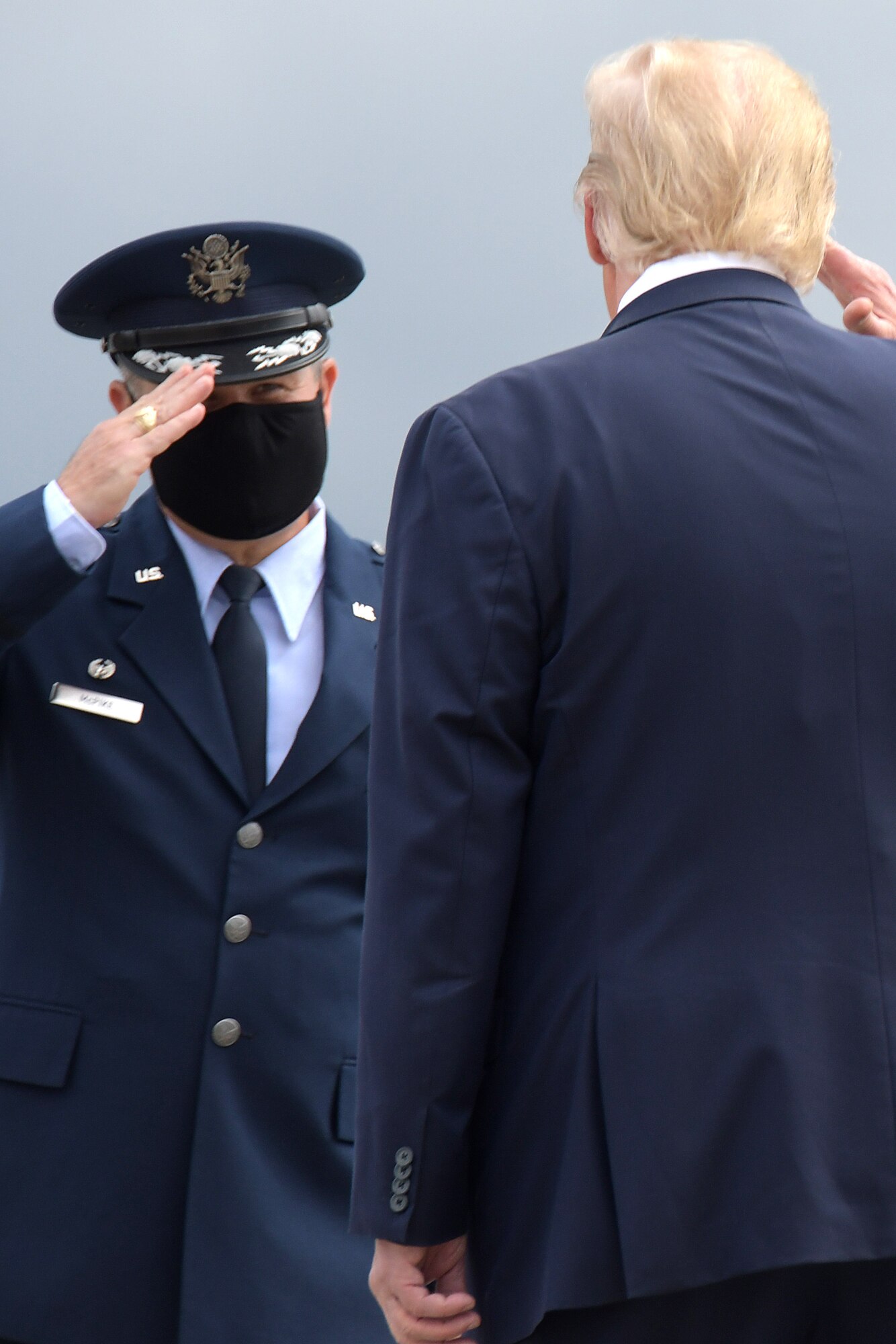 Col. Craig McPike, 94th Airlift Wing commander, saluted President Trump as he departs Air Force One at Dobbins Air Reserve Base, Ga., Sept. 25, 2020. The president arrived at Dobbins to attend a meeting at the Cobb Galleria. (U.S. Air Force photo/Andrew Park)
