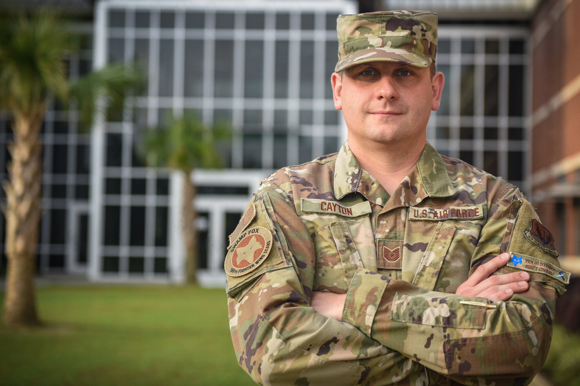 U.S. Air Force Tech. Sgt. Justin Cayton, a production recruiter for the 169th Fighter Wing, poses for a portrait in front of the Joint Armed Forces Reserve Center at McEntire Joint National Guard Base on August 18, 2020. Cayton is an Air National Guard recruiter charged with guiding potential recruits and applicants throughout their enlistment journey into the South Carolina Air National Guard. (U.S. Air National Guard photo by Senior Airman Mackenzie Bacalzo, 169th Fighter Wing Public Affairs)