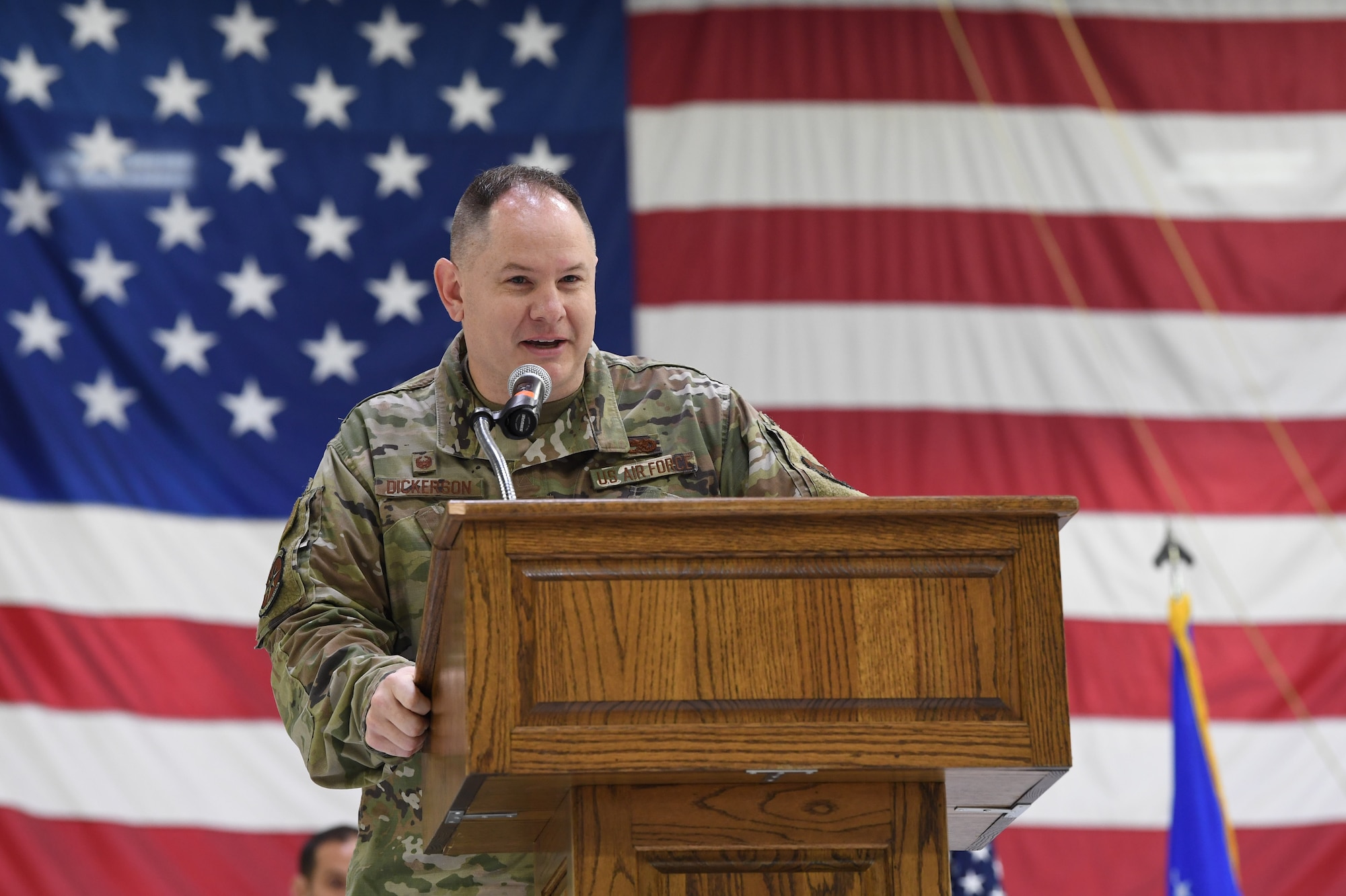 Maj. Matthew Dickerson, 434th Aircraft Maintenance Squadron commander, gives a speech after a change of command ceremony with the outgoing commander, Lt. Col. John Valdes. Dickerson moved into the role after three years as commander of the 434th Maintenance Operations Section.