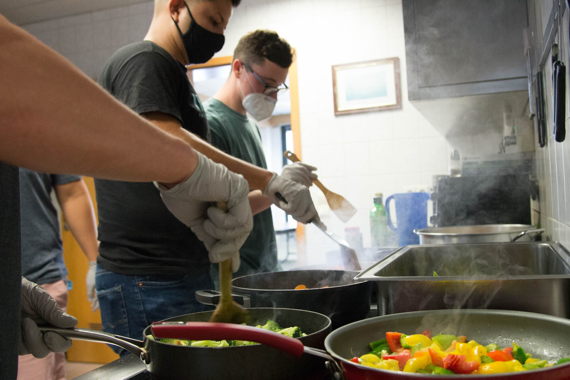 Photo of volunteers preparing food.