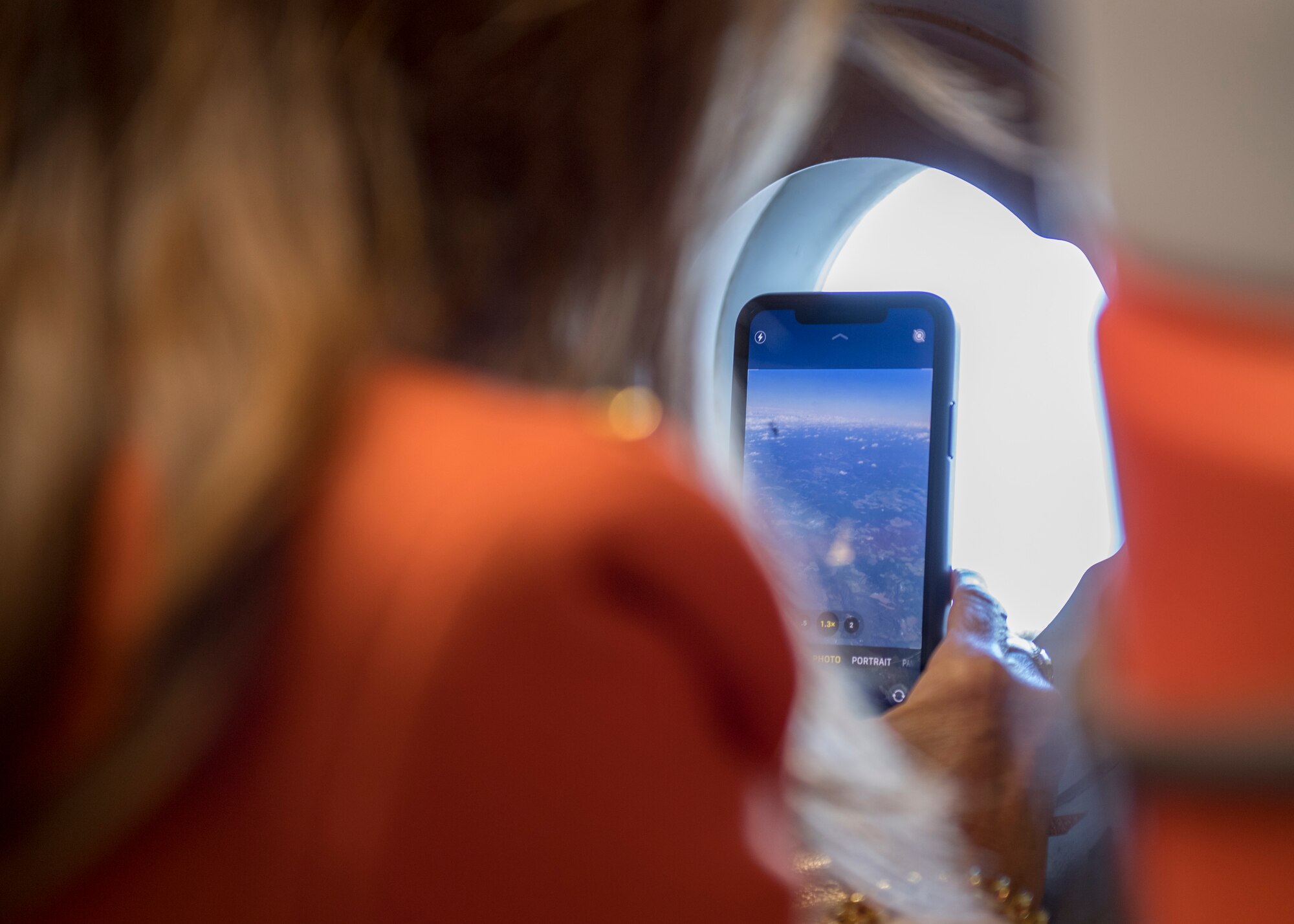 Rochelle Stachel, president of HRV Conformance Verification Associates Inc., takes a photo during a civic leader flight over the state of Pennsylvania, Oct. 1, 2020.