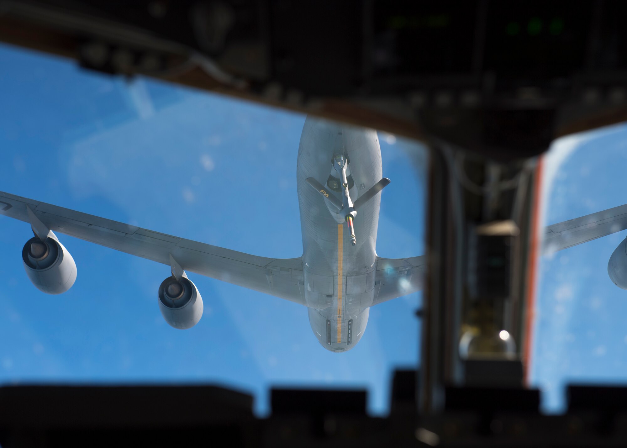 A KC-135 Stratotanker assigned to the 171st Air Refueling Wing performs an in-flight air refueling exercise with a C-17 Globemaster III assigned to the 911th Airlift Wing over the state of Pennsylvania, Oct. 1, 2020.