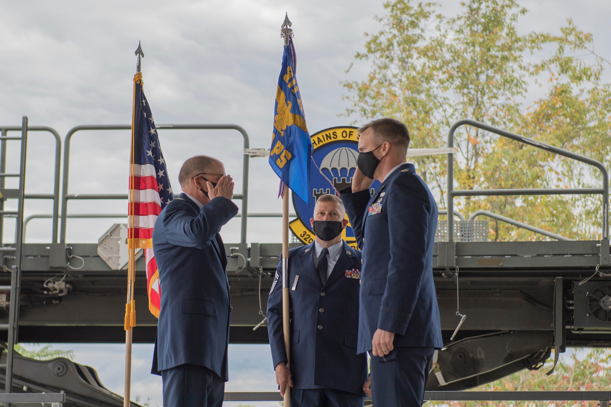 Maj. Erik Hofmeyer, commander of the 32nd Aerial Port Squadron, salutes Col. Kenneth M. Lute, commander of the 911th Mission Support Group, during his assumption of command ceremony at the Pittsburgh International Airport Air Reserve Station, Pennsylvania, Oct. 3. 2020.