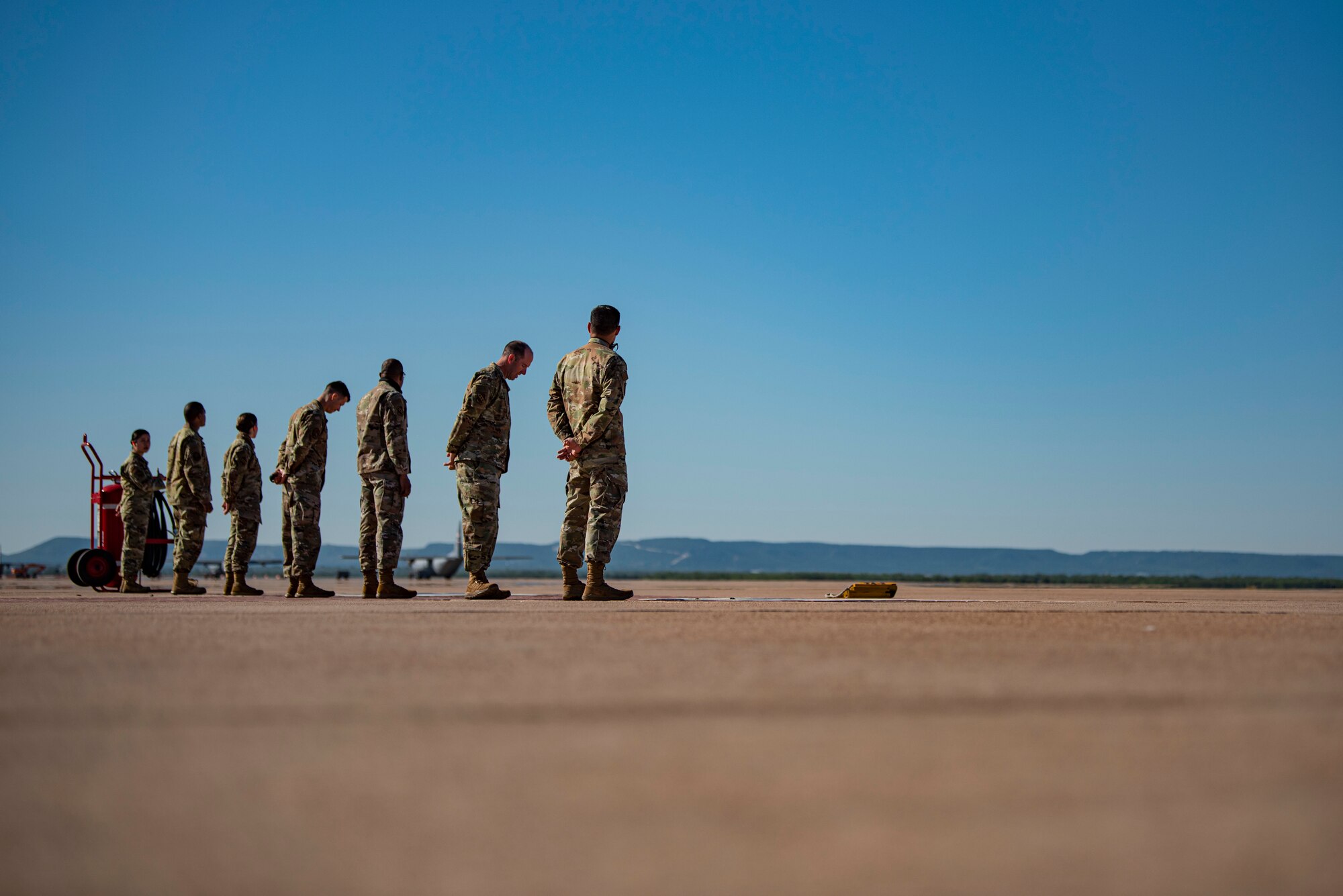 Dyess Air Force Base leadership and Airmen await the arrival of Air Force Global Strike Command leadership on the flightline at Dyess AFB, Texas, Sept. 30, 2020. AFGSC is comprised of approximately 33,700 professionals assigned to two Numbered Air Forces and nine wings that provide strategic deterrence, global strike and command support. (U.S. Air Force photo by Airman 1st Class Colin Hollowell)