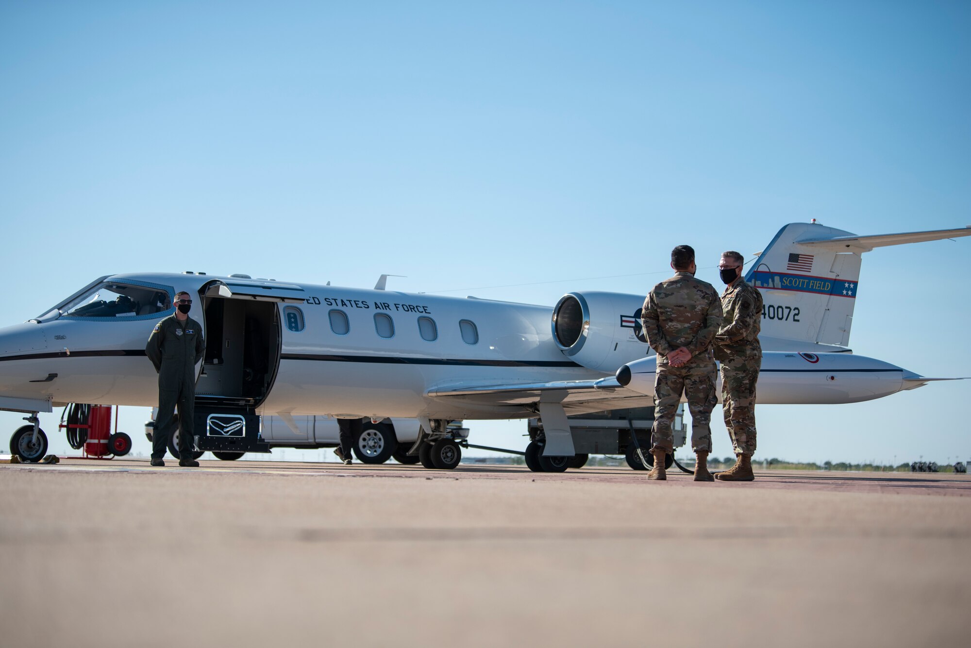 Gen. Tim Ray, Air Force Global Strike Command commander, right, talks to Col. Ed Sumangil, 7th Bomb Wing commander, before boarding a C-21 passenger jet on the flightline at Dyess Air Force Base, Texas, Sept. 30, 2020. Ray toured five different locations throughout Dyess AFB where he received briefings on programs and operations being performed throughout the 7th BW. (U.S. Air Force photo by Airman 1st Class Colin Hollowell)