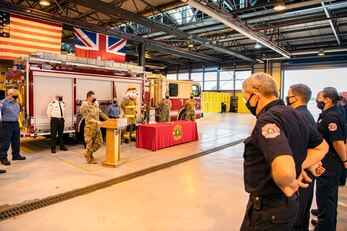 U.S. Air Force Col. Richard Martin, center, 423rd Air Base Group commander, speaks during a fire safety proclamation signing at RAF Alconbury, England, Oct. 5, 2020. Martin proclaimed Oct.5-9 as Fire Prevention week, which is designed to honor the sacrifices of our firefighters and teach fire safety to others. (U.S. Air Force photo by Senior Airman Eugene Oliver)