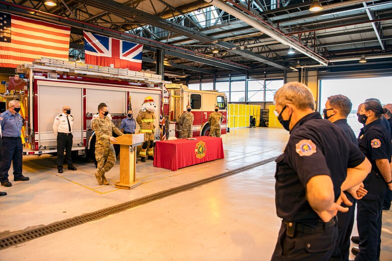U.S. Air Force Col. Richard Martin, center, 423rd Air Base Group commander, speaks during a fire safety proclamation signing at RAF Alconbury, England, Oct. 5, 2020. Martin proclaimed Oct.5-9 as Fire Prevention week, which is designed to honor the sacrifices of our firefighters and teach fire safety to others. (U.S. Air Force photo by Senior Airman Eugene Oliver)
