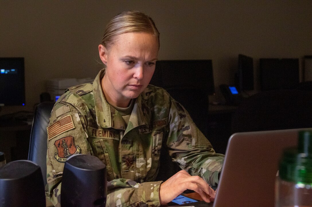 Maj. Lyndsey Fleming, lead of Task Force Vaccine, prepares for a meeting at Joint Force Headquarters in Concord on Sept. 29. Photo by Sgt. Courtney Rorick, 114th Public Affairs Detachment NCOIC
