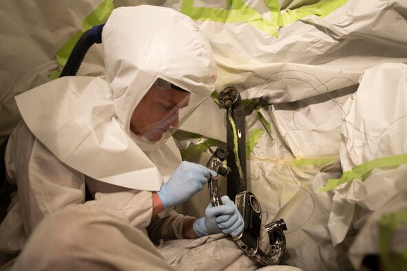Senior Airman Jacob Blann 434th Aircraft Maintenance  Squadron, flight line crew chief prepares the control column and yoke of a KC-135 Stratotanker for paint on Grissom Air Reserve Base, Indiana, on Aug. 10, 2020. The 434th Maintenance Squadron recently finished refurbishing one of Grissom’s KC-135R Stratotankers, a 30-day process which involves completely disassembling the interior aircraft, performing restoration tasks on the parts, and rebuilding it. (U.S. Air Force photo by Tech Sgt. Joshua Weaver)