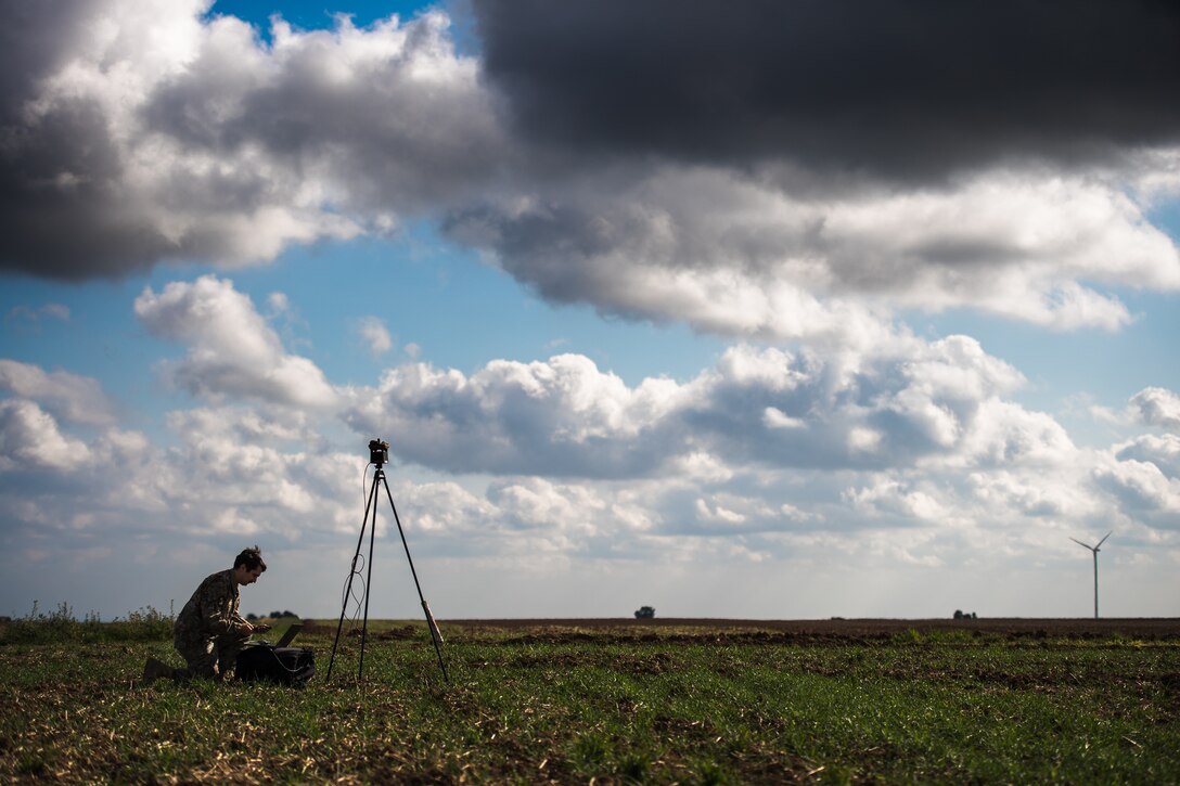 Photo of Airman forecasting weather