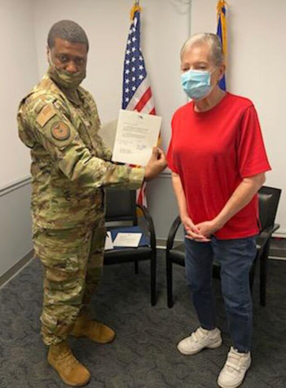 Lt. Col. Marcus Stevenson, 333rd RCS commander, presented Gertrude “Trudy” Kulikamp her 50 year certificate and pin during a video teleconference Sept. 27, 2020, with Maj. Gen. Ed Thomas, Air Force Recruiting Service commander.
