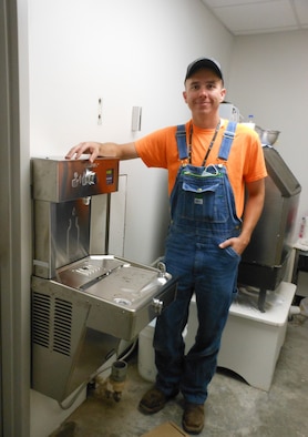 Andrew Bowen, pipefitter with Base Operations and Support, installs a filtered water fill station at Arnold Air Force Base, Tenn., Sept. 16, 2020, as part of a project ensuring that the AEDC workforce has drinking water sources available on base. (U.S. Air Force photo)