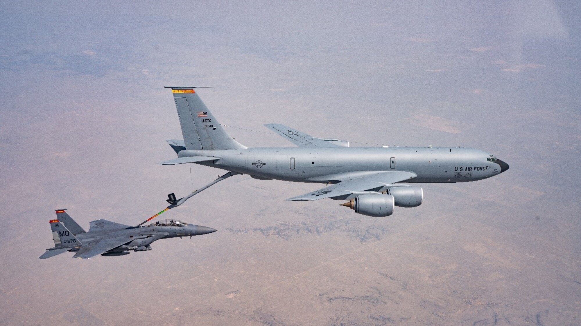 An F-15E Strike Eagle from the 389th Fighter Squadron refuels with a KC-135 Stratotanker from Altus AFB, OK, over an air refueling track en route to Vance AFB, OK. (U.S. Air Force photo by Maj. Mark Calendine)