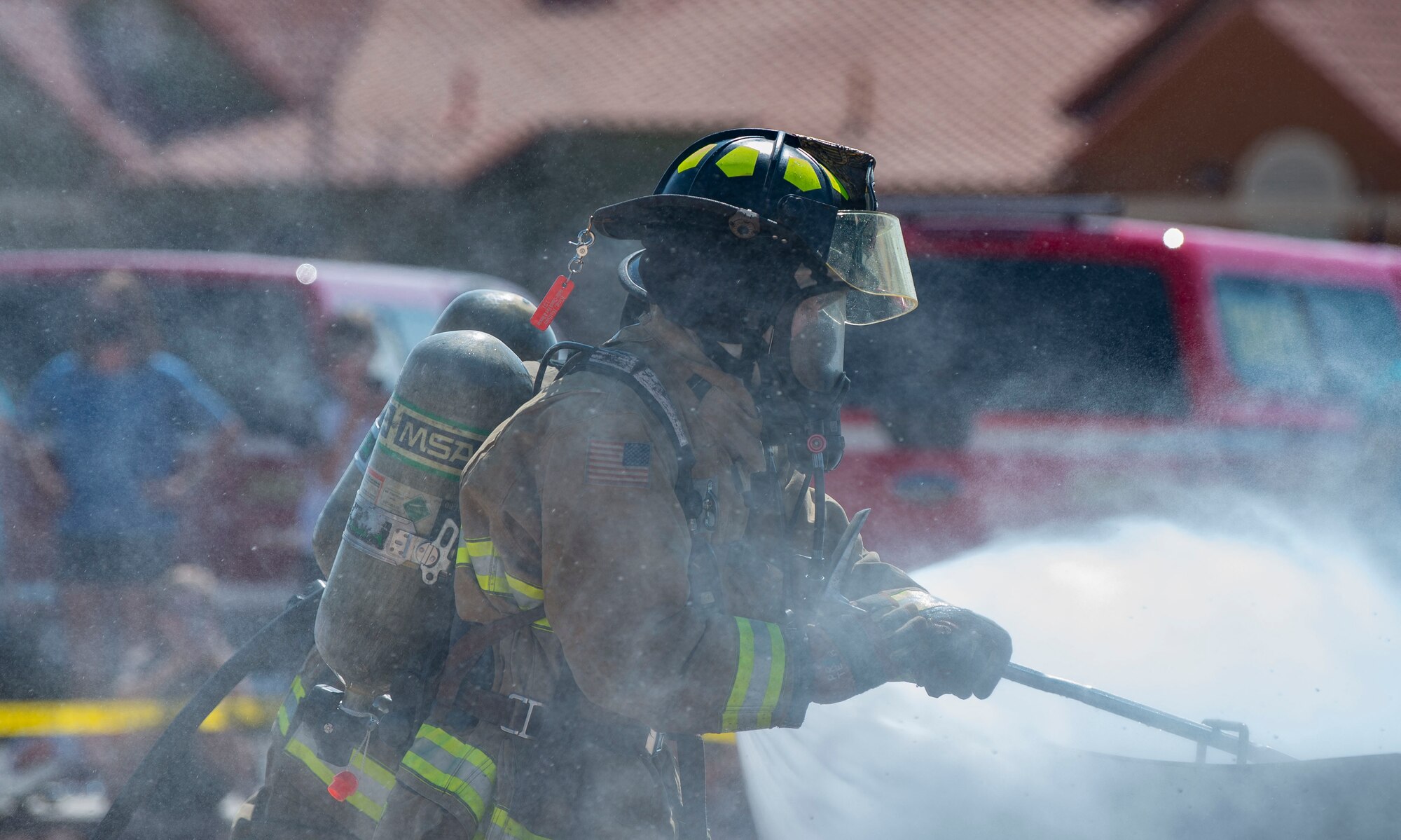 Firefighters put our car fire during demonstration.