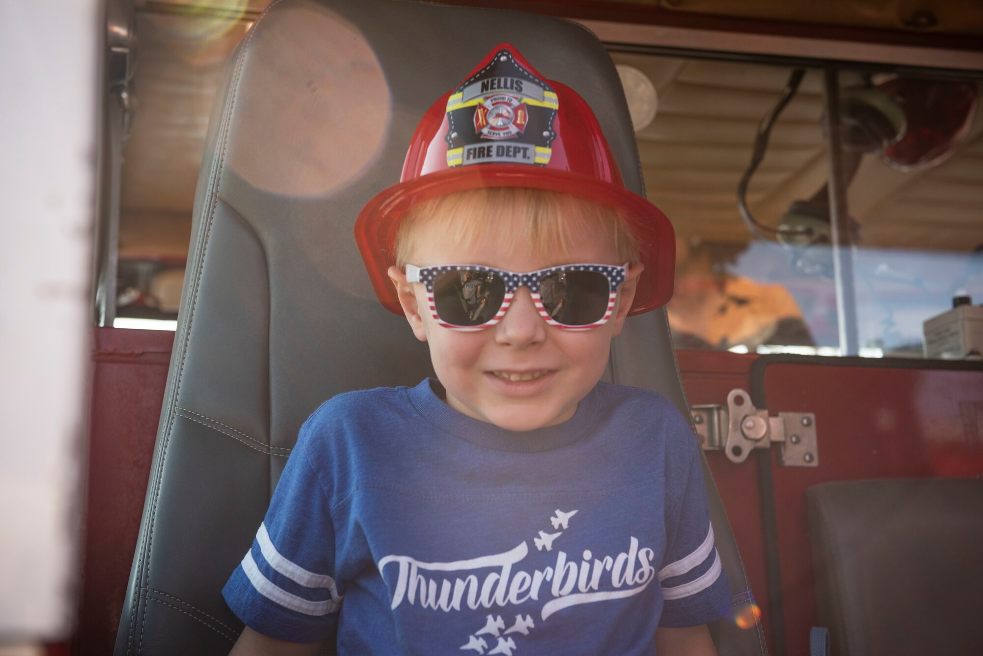 Child poses for photo.