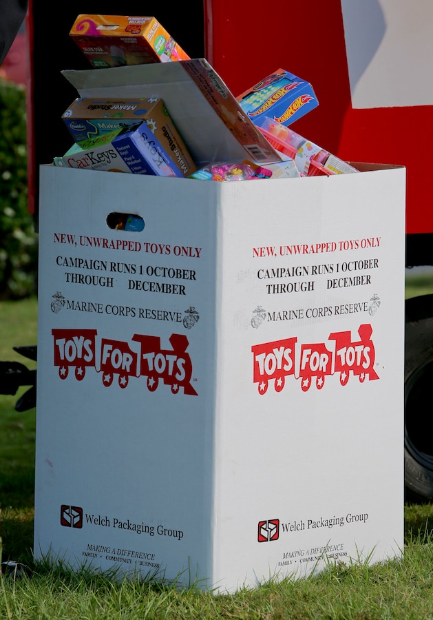 Staff Sgt. Tara Ballard, coordinator, Toys for Tots, and Capt. Rebecca Sullivan, commanding officer, Salvation Army, gathered aboard Marine Corps Logistics Base Albany to formally kickoff the 73rd annual Toys for Tots campaign, Oct. 2. (U.S. Marine Corps photo by Jennifer Parks)
