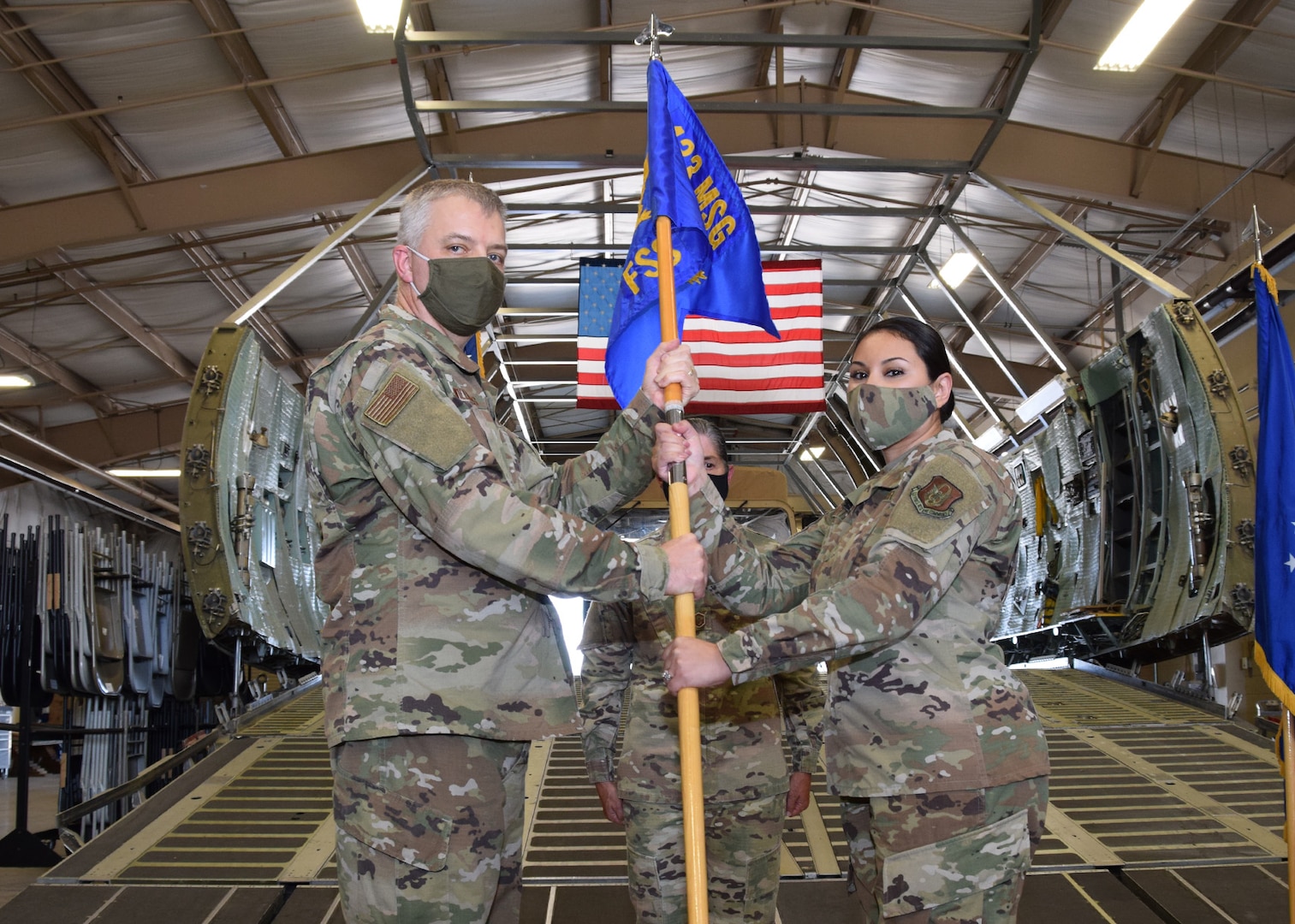 Col. Wayne M. Williams, 433rd Mission Support Group commander, presents the 433rd Force Support Squadron guidon to Maj. Thanya A. Martinez, during a change of command ceremony Oct. 4, 2020 at Joint Base San Antonio-Lackland, Texas.