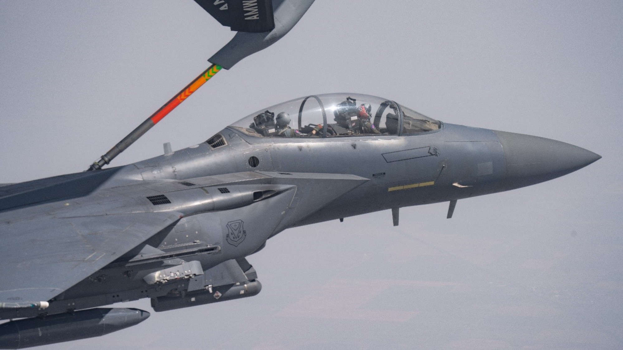 An F-15E Strike Eagle from the 389th Fighter Squadron refuels with a KC-135 Stratotanker over Colorado.(U.S. Air Force photo by Maj. Mark Calendine)