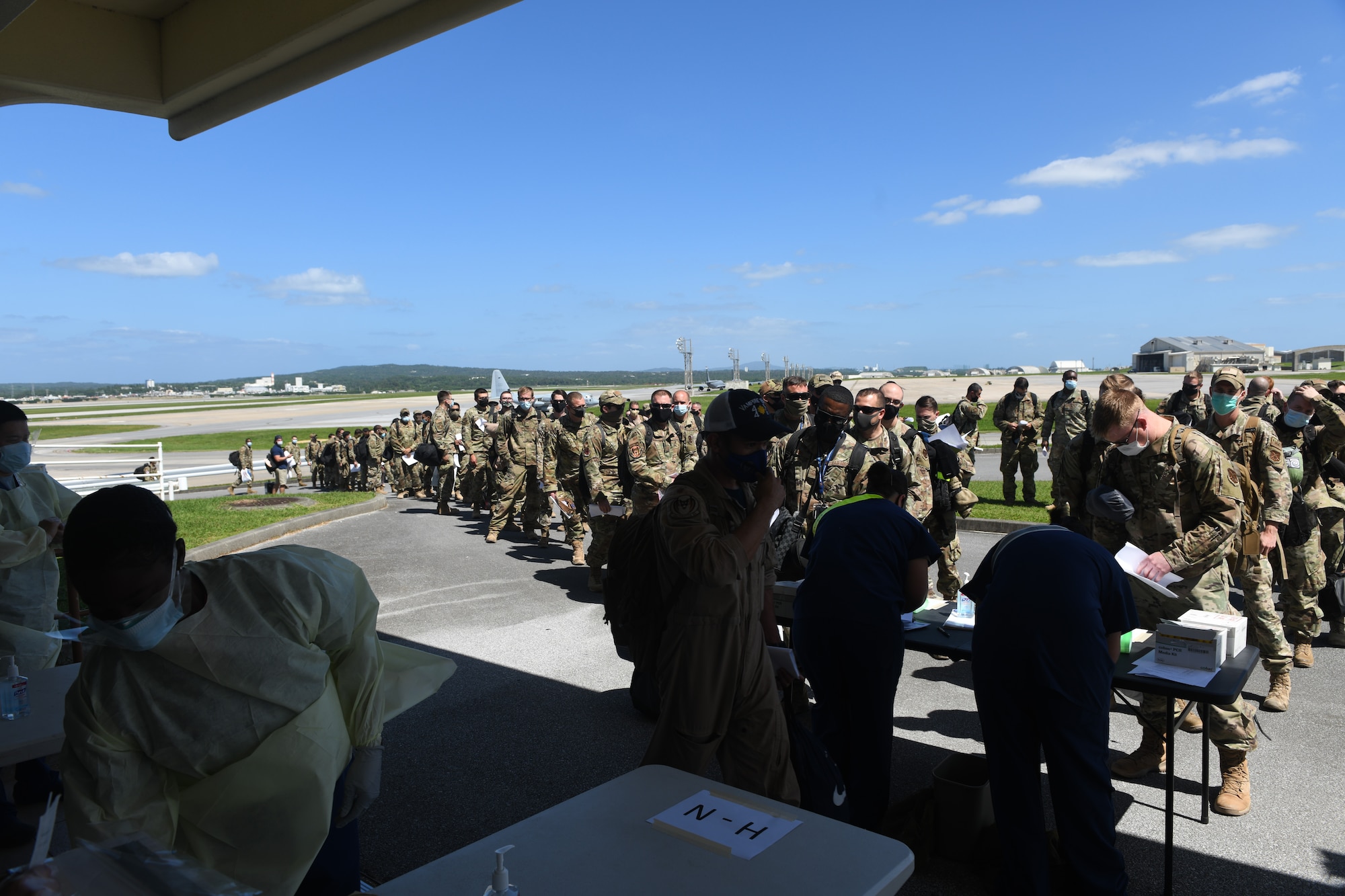 Airmen from the 18th Wing in-process after returning from a deployment to U.S. Central Command Oct. 6, 2020, at Kadena Air Base, Japan. More than 300 Airmen assigned to the 18th Operations and Maintenance Groups as well as pilots and aircraft assigned to the 44th Fighter Squadron deployed to the CENTCOM theater to defend U.S. and partner nation interests. During their deployment, Airmen conducted more than 1,000 sorties and 5,300 combat hours, which drove 13 phase inspections in six months. They’ll share the skills they learned in combat with Team Kadena, joint partners and allies to ensure a free and open Indo-Pacific. (U.S. Air Force photo by Tech. Sgt. Benjamin Sutton)