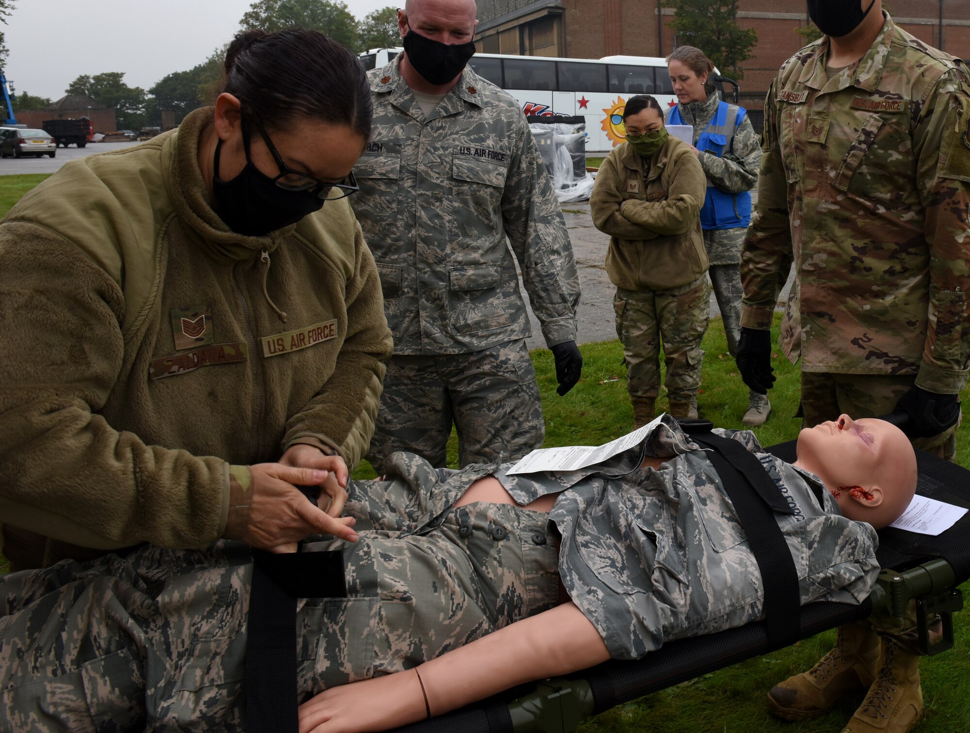 An Airman assigned to the 48th Fighter Wing Medical Group secures a medical simulation manikin during Mission Assurance Exercise 20-20 at Royal Air Force Feltwell, England, Sept. 29, 2020. During the exercise, medical personnel received unique training and challenged their proficiency, practicing medical skills and procedures while treating simulated injuries in a forward operating location. (U.S. Air Force photo by Airman 1st Class Rhonda Smith)