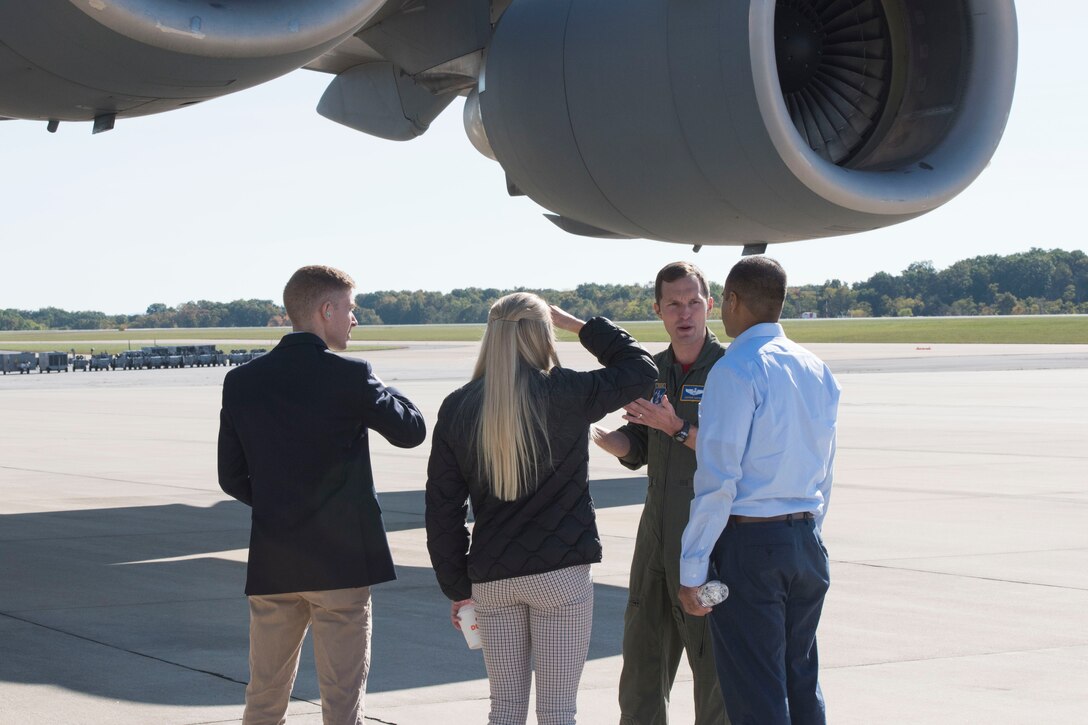 167th Airlift Wing pilot, Maj. Matthew Mottet, guides pilot candidates around the exterior of a C-17 Globemaster III, at the Martinsburg, W. Va. air base, Oct. 3, 2020. Eleven pilot candidates participated in a pilot’s selection board during October’s unit training assembly.
