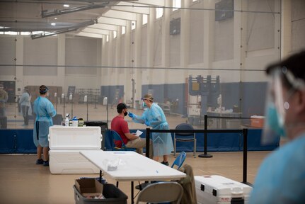 167th Medical Group Airmen assist with COVID-19 nasal swab testing for the local community at the West Virginia University Student Recreation Center, Morgantown, W Va., Sept. 30, 2020. The Airmen are assigned to West Virginia National Guard’s task force medical team which has been assisting county health departments throughout the state during the pandemic.