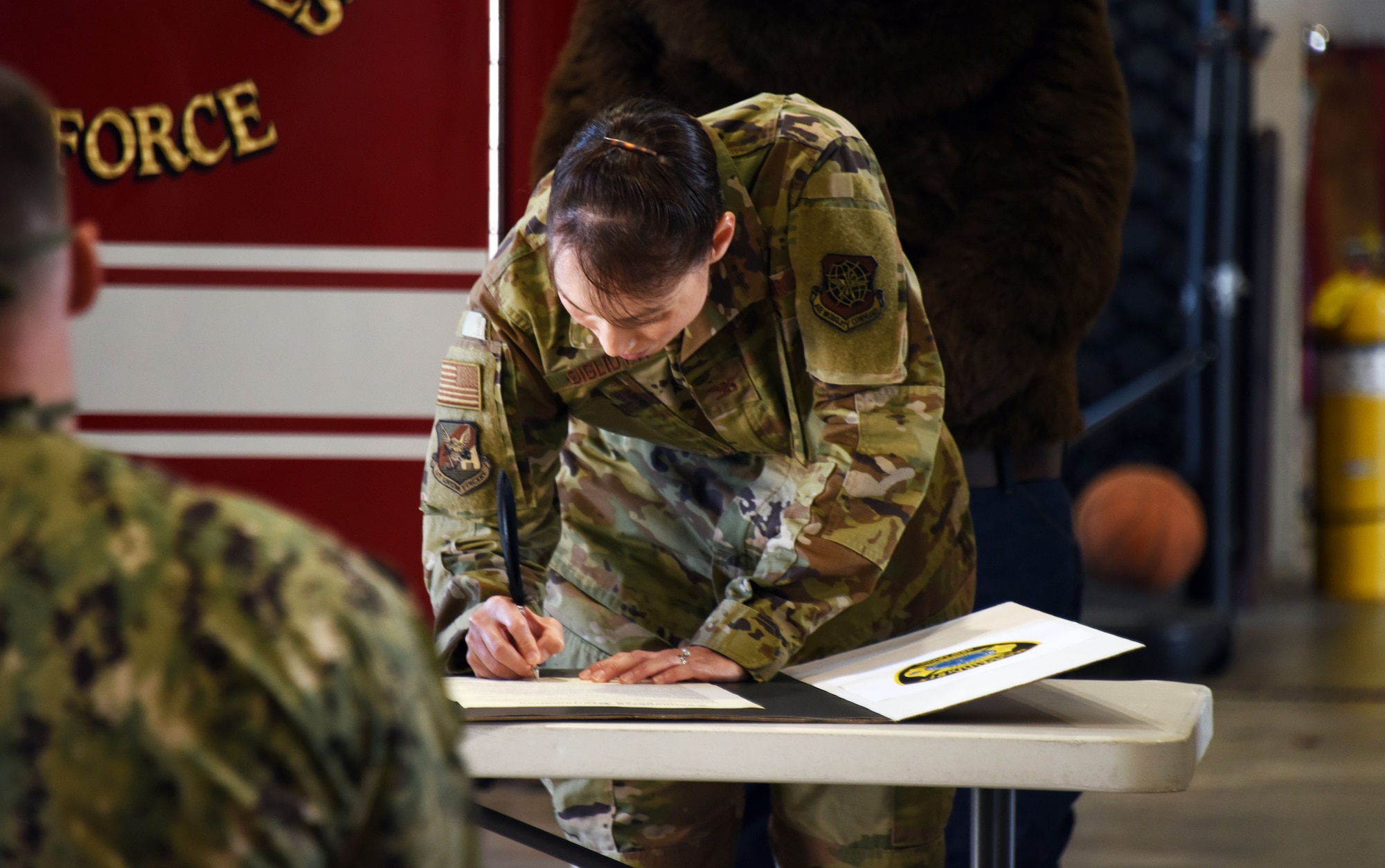 U.S. Air Force Colonel Bridget Gigliotti, Joint Base McGuire-Dix-Lakehurst and 87th Air Base Wing commander, signs the Commanders Proclamation, Oct. 5, 2020 at Joint Base MDL, N.J. Fire Prevention Week begins October 4th and runs until October 10th. The goal of Fire Prevention Week is to raise fire safety awareness around the JB MDL Community.