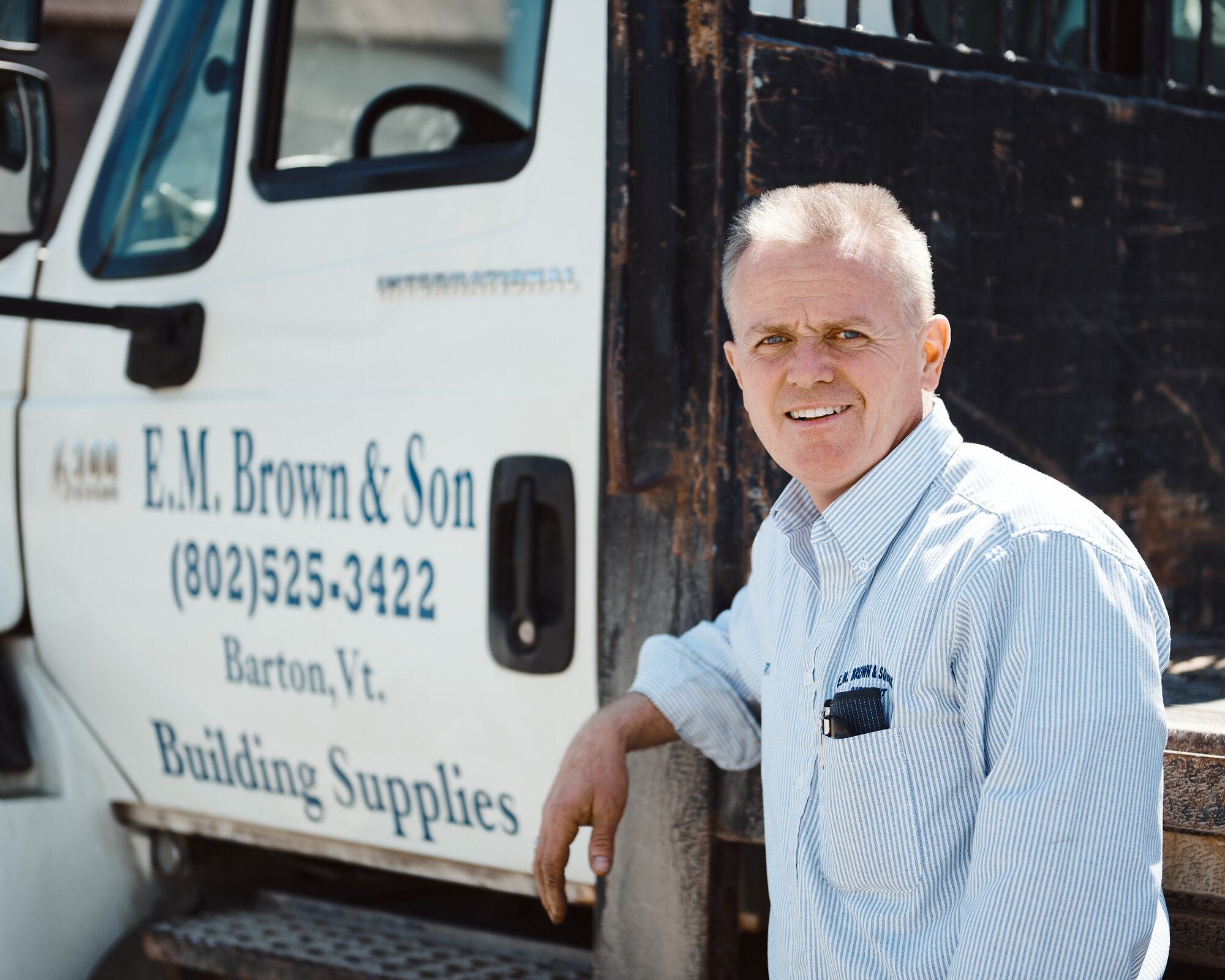 Master Sgt. Arthur LaPlante stands outside of E.M. Brown & Son, a hardware store he co-owns that has been a part of the local community since the 19th century.