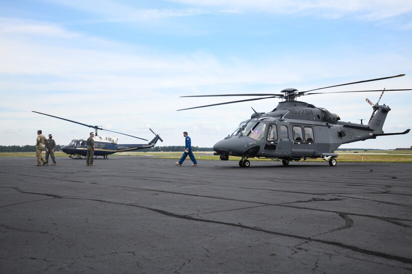 A UH-1N “Huey” (left) and an MH-139A Grey Wolf (right) sit side-by-side at an airfield in Richmond, Va., July 30, 2020.
