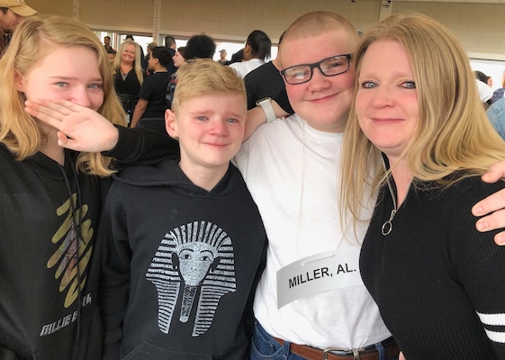 Mountaineer ChalleNGe Academy Mother Trisha Miller poses with her son, Alexander, and his siblings. Miller was so impressed with the experience her son is having in the MCA program, that she has become an employee at the newly opened Mountaineer ChalleNGe Academy - South located in Montgomery, West Virginia. (Courtesy Photo)