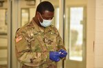 Private 1st. Class Silvester Hughes, assigned to the 156th Expeditionary Signal Battalion, labels a COVID-19 sample during a testing event Sept. 23, 2020, at Ionia, Mich. The Michigan Army and Air National Guard have established an extensive COVID testing program for prisons across the state.