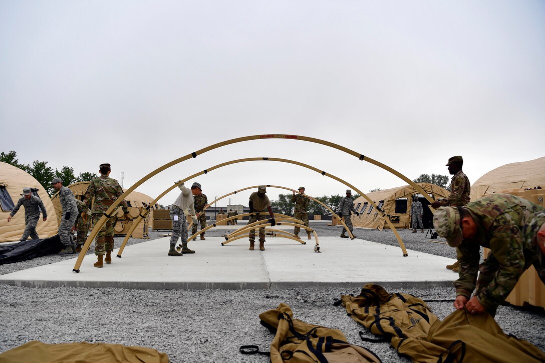 Airmen from the 434th Civil Engineer Squadron set up tents on Grissom Air Reserve Base, September 10, 2020. Airmen from the 434th Civil Engineer Squadron recently put their training to the test, setting up a bare base with 24 tents, in roughly 10 hours.