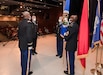 Col. Elliott R. Caggins, Brig. Gen. Vincent F. Malone II, Col. Scott J. Madore and MSgt. Willie D. Richardson (l-r) prepare to pass the Acquisition flag during Project Manager Soldier Lethality’s July 10 Change of Charter Ceremony at Picatinny Arsenal, N.J.  Col. Malone replaced Col. Caggins who retired from the Army after 30 years of service.