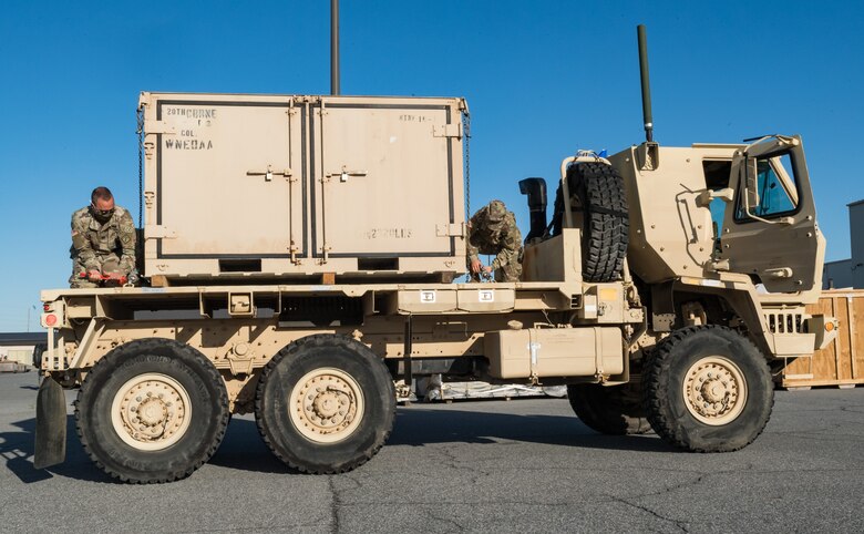 Members of the U.S. Army’s 20th Chemical, Biological, Radiological, Nuclear and Explosives Command prepare a vehicle for a convoy to Aberdeen Proving Ground, Maryland, Sept. 19, 2020, at Dover Air Force Base, Delaware. The 20th CBRNE Command recently conducted a deployment readiness exercise, which consisted of several inspections, aerial troop movements and convoys. The 20th CBRNE Command ensures the effective countering of CBRNE hazards at home and abroad. Dover AFB serves as the primary port of embark for the 20th CBRNE Command during both exercises and operations and regularly supports similar joint missions. (U.S. Air Force photo by Roland Balik)