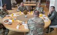 (Left to right) Chief Master Sgt. James E. Clark, U.S. Air Forces Southern command chief, Command Sgt. Maj. Trevor C. Walker, U.S. Army South command sergeant major, Maj. Gen. Daniel R. Walrath, U.S. Army South commander, and Maj. Gen. Barry Cornish, Air Forces Southern commander, conduct a lunch meeting in Bogota, Colombia, Oct. 7. The leaders of two U.S. Southern Command’s service component commands, who traveled separately to Colombia to reinforce their commitment to the region, increase collaboration, enhance interoperability, and assist in building partner nation capacity with their respective Colombian counterparts, made time in their schedules to engage with each other in person – an infrequent opportunity due to COVID-19. U.S. Army South is part of a multinational and whole-of-government team working to advance security, governance, and economic opportunity in Central and South America and the Caribbean.