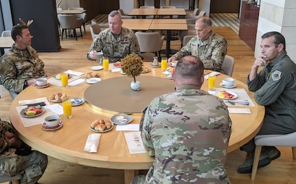 (Left to right) Chief Master Sgt. James E. Clark, U.S. Air Forces Southern command chief, Command Sgt. Maj. Trevor C. Walker, U.S. Army South command sergeant major, Maj. Gen. Daniel R. Walrath, U.S. Army South commander, and Maj. Gen. Barry Cornish, Air Forces Southern commander, conduct a lunch meeting in Bogota, Colombia, Oct. 7. The leaders of two U.S. Southern Command’s service component commands, who traveled separately to Colombia to reinforce their commitment to the region, increase collaboration, enhance interoperability, and assist in building partner nation capacity with their respective Colombian counterparts, made time in their schedules to engage with each other in person – an infrequent opportunity due to COVID-19. U.S. Army South is part of a multinational and whole-of-government team working to advance security, governance, and economic opportunity in Central and South America and the Caribbean.