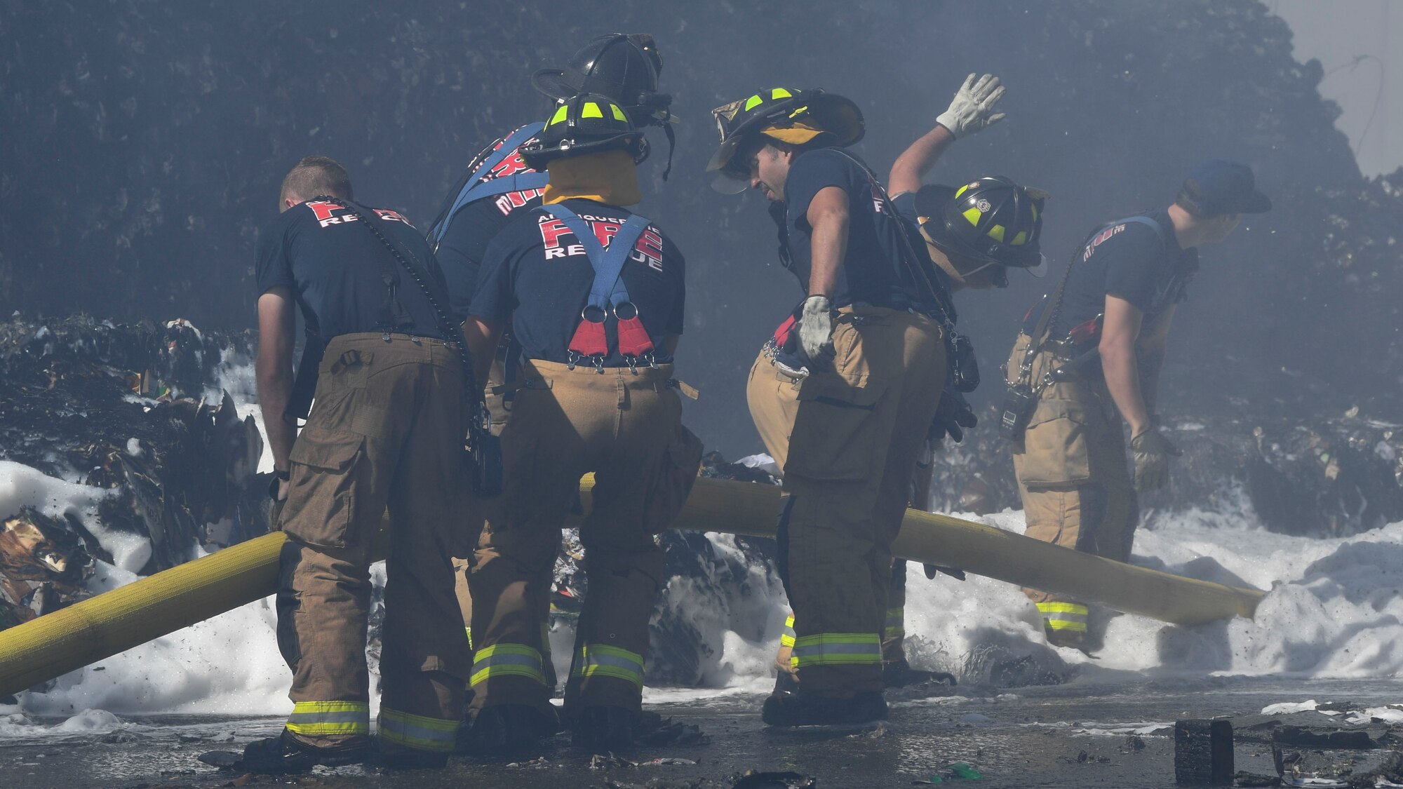 Firefighters putting out a fire.