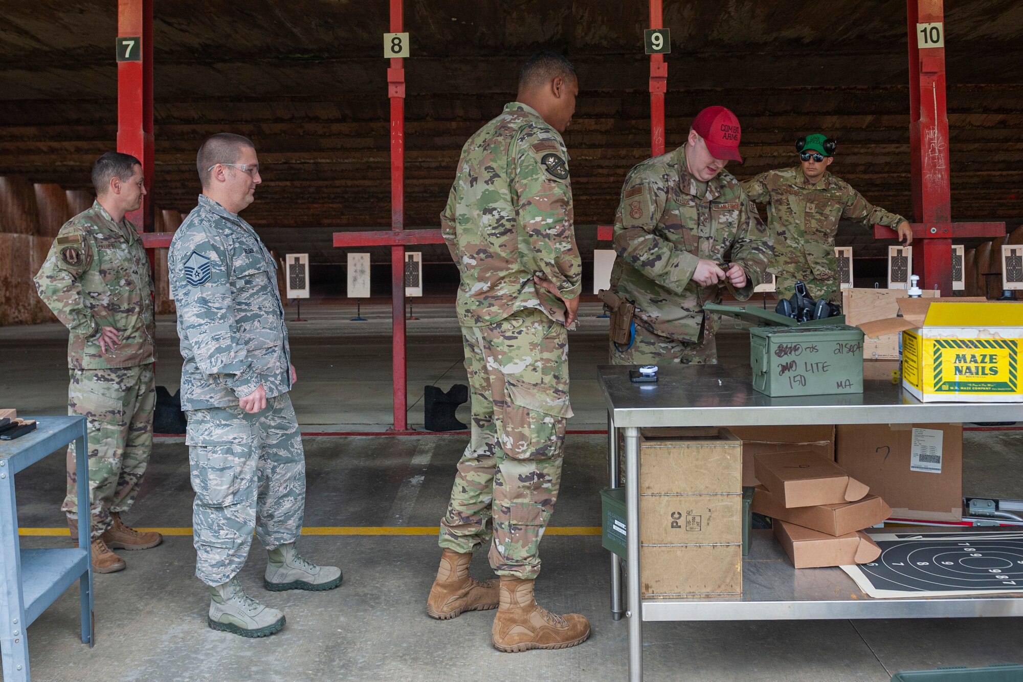 Photo of Airmen receiving pistols