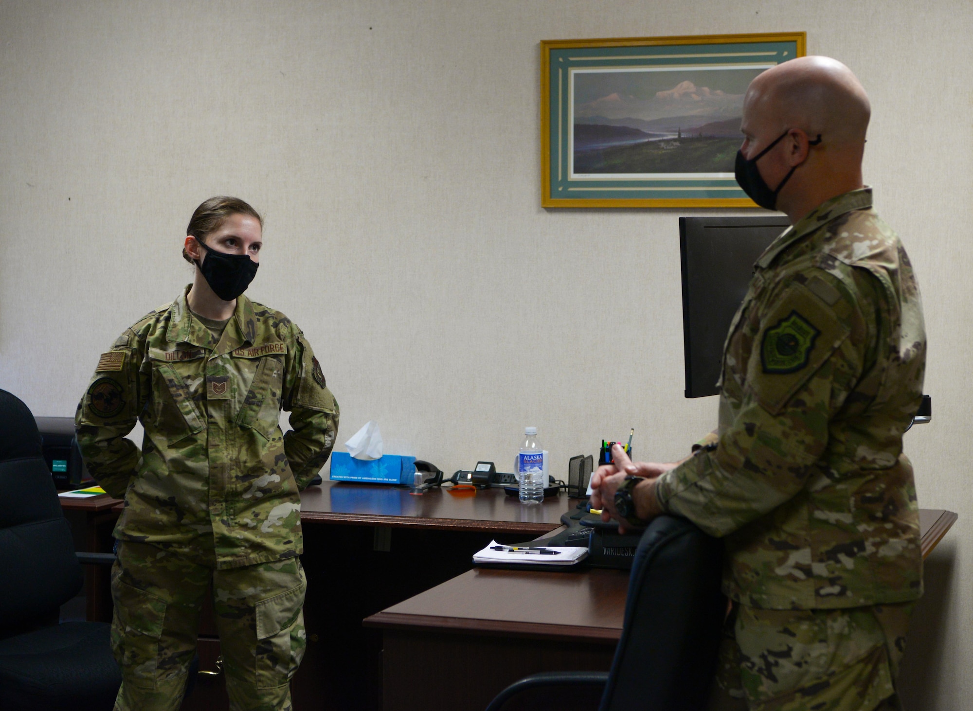 U.S. Air Force Col. David Berkland, right, the 354th Fighter Wing commander, speaks with Tech. Sgt. Rachel Dillon, a 354th Force Support Squadron manpower specialist during a wing leadership immersion on Eielson Air Force Base, Alaska, Oct. 6, 2020. Berkland uses immersions to engage with junior Airmen and frontline supervisors to gain a more in depth look at Eielson’s mission. (U.S. Air Force photo by Senior Airman Beaux Hebert)