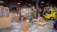 Logistics specialists and soldiers from the Army Reserve’s 393rd Medical Logistics Company sort and repackage medical supplies.