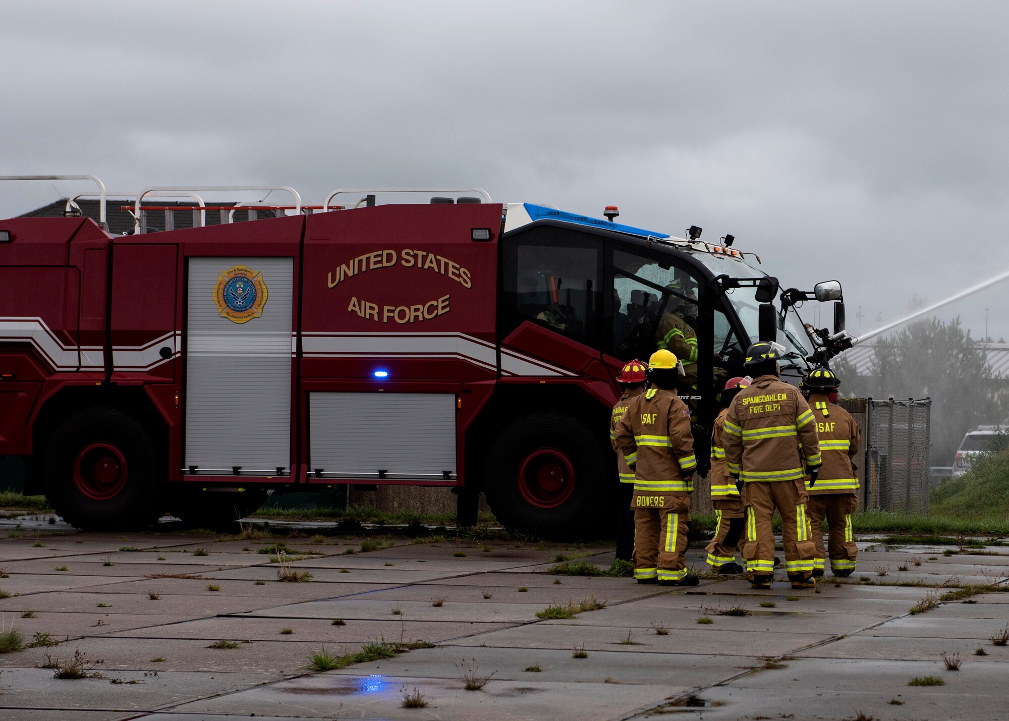 52nd Civil Engineer Squadron Fire and Emergency Services Airmen hosted a demonstration for 52nd Fighter Wing leadership to highlight Fire Prevention Week, Oct. 5, 2020, at Spangdahlem Air Base, Germany. 52nd FES Airmen and German civilian firefighters demonstrated their new fire truck and showed its capabilities and new equipment compared to their older fire trucks. (U.S. Air Force photo by Senior Airman Melody W. Howley)