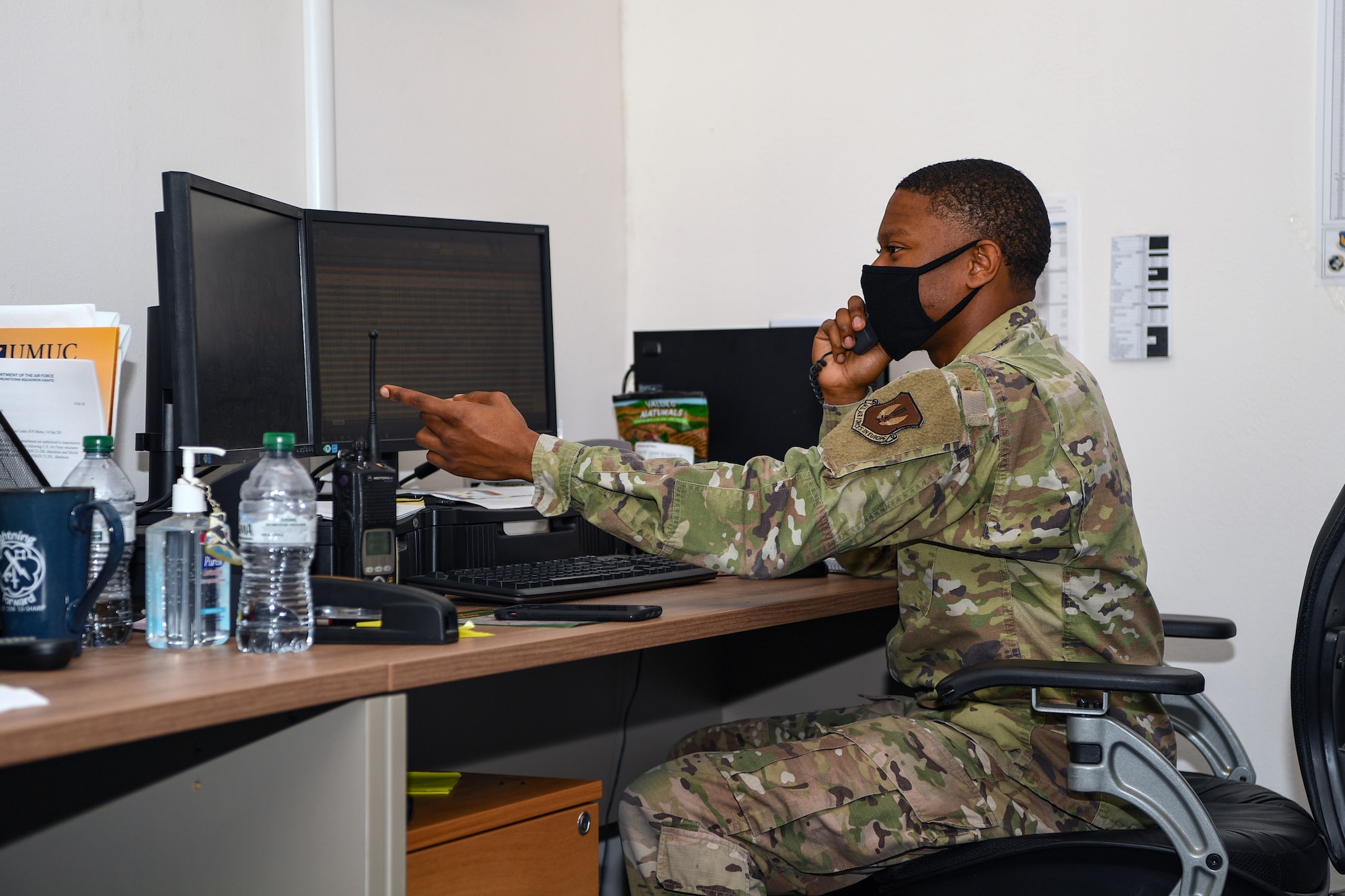 An Airman with the 731st Munitions Squadron takes part in the control portion of the exercise Waking Giant at Camp Darby, Italy, Oct. 7, 2020. Control was in charge of relaying messages between all personnel and keeping track of everything happening during the exercise. (U.S. Air Force photo by Airman 1st Class Thomas S. Keisler IV)